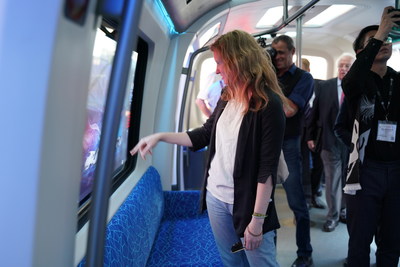 Media and visitors show great interests in CETROVO's magic window, which can transform into a touch-screen and allows passengers to perform tasks like watching videos and even paying tickets on it.