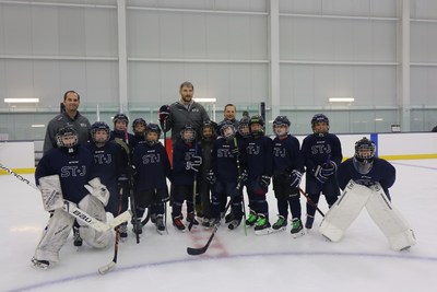 Washington Capitals star and founding member of The St. James Alex Ovechkin joins the U10 travel team ahead of their exhibition game during The St. James grand opening.