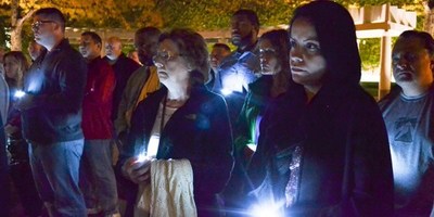 Helen Andujar, wife of fallen correctional officer Lieutenant Osvaldo Albarati, attends a vigil for correctional workers in Washington, D.C.