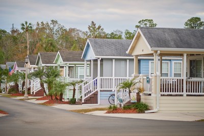 Whimsical yet practical, the newly renovated colorful cottages line the streets of the upgraded Tropical Palms RV Resort in Kissimmee, Florida. Starting at $129/night and less than five miles from Disney, these vacation rentals offer a fun and affordable alternative for Orlando area vacationers.