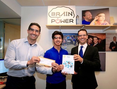 Jamie Menhall, (center) the teen-founder of GoFAR, is pictured along with Brain Power's founder and CEO, Dr. Ned T. Sahin (right), and Brain Power's Chief Medical Officer Dr. Arshya Vahabzadeh (left) All three are wearing the Empowered Braintm.