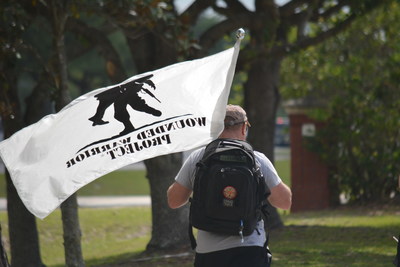 Carry Forward military run / walk - participants carry a flag, a weight or rucksack, or a person