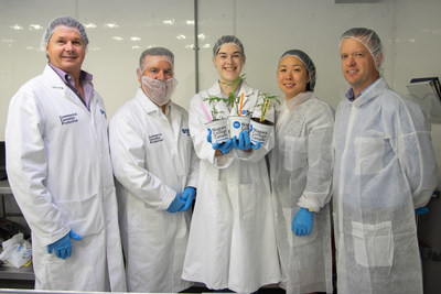 NC Commercial Cannabis Production student Elizabeth Foley (middle) displays cannabis plants donated to the program by Up Cannabis, alongside (L-R) Bill MacDonald, NC’s Commercial Cannabis Production program coordinator, Al Unwin, associate dean of environment and horticulture, Ruth Chun, general counsel for Up Cannabis and Newstrike Brands, and Sean Sinclair, project manager for Up Cannabis. 50 plants were donated to enhance the hands-on learning opportunities students receive through the program. (CNW Group/Newstrike Brands Ltd.)
