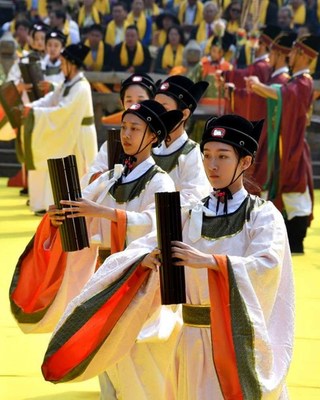 Dancers dressed in Song and Ming Dynasty style danced accompanied by music as public memorial ceremony in front of Dacheng Hall