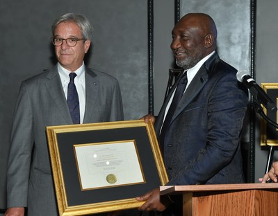 International Recognition: Mike Perlis, CEO and Vice-Chairman of Forbes Media (L), presenting the Africa’s Oil and Gas Leader of the Year Award won by Benedict Peters, Executive Vice Chairman, Aiteo Group, at the “Best of Africa” event by Forbes International, to Francis Peters, Deputy Group Managing Director, Aiteo Group, at Forbes Headquarters in New York recently.