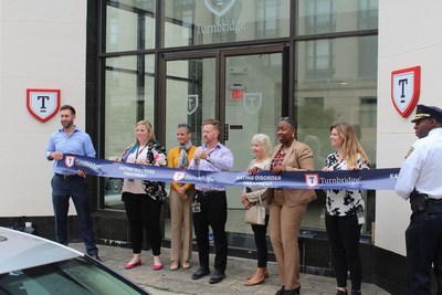 Turnbridge and community members gather for the ribbon cutting announcing the eating disorder treatment expansion