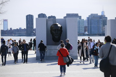 Visitors gather at the bust of President Roosevelt at FDR Four Freedoms State Park on the southern tip of Roosevelt Island. Photo courtesy: Jason Wang