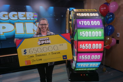 Gina Barriault of Braeside celebrates after spinning THE BIGGER SPIN Wheel at the OLG Prize Centre in Toronto to win $650,000. Barriault was the first top prize winner of OLG’s new INSTANT game – THE BIGGER SPIN. (CNW Group/OLG Winners)