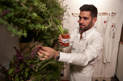 Bartender with garnishes The Ketel One ‘Better’ serves inspire bartenders to rethink their recipes of popular cocktails, by using locally sourced, natural ingredients to enhance the flavour. (PRNewsfoto/Ketel One)