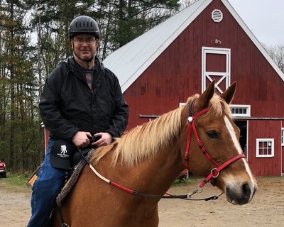 Injured veterans connect during equine therapy