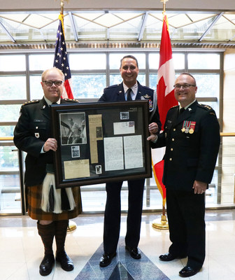 Service and Sacrifice Initiative co-founders Honorary Colonel Kevin McCormick (left) and Lieutenant Colonel Michael Motyl (right) with U.S. Defense Attach Colonel William J. Rowell (center) during a ceremony held at the U.S. Embassy in Ottawa on September 26, 2018. (CNW Group/Huntington University)