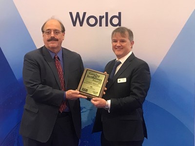 Frank Legato, editor of GGB Magazine (left) presents Ian Hughes, VP of Global Services, Gaming Laboratories International (GLI) with the Gold Award for Best Productivity-Enhancement Technology for GLI's Testing Automation.