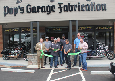 Pop's Garage Fabrication Team and Roswell Inc. Officials Cut Ceremonial Ribbon