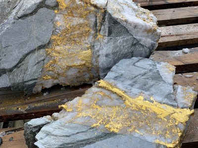 Figure 2: Gold specimen slab, cut with a diamond chain saw, exposing gold/quartz veining. (CNW Group/RNC Minerals)