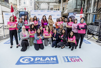 Plan International Canada President & CEO Caroline Riseboro (centre left), Plan International Canada Global Ambassador Sophie Grégoire Trudeau (centre right) and Girl Ambassadors strike a defiant pose with International Day of the Girl statues at the CF Toronto Eaton Centre on October 11, 2018. (Josh Fee/Plan International Canada) (CNW Group/Plan International Canada)