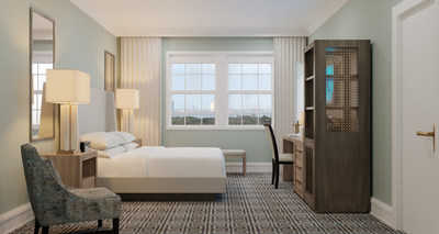 Above, an image of the new room design at Seaview, a Dolce Hotel, invoking cool, coastal blues inspired by the sea and featuring modern furnishings and amenities for guests.