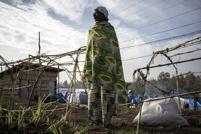 Jeanne* inside an Internally Displaced Persons (IDP) camp in Bunia, March 31, 2018. Jeanne and her three children fled her village in January 2018 after it was attacked and her house burned by the militia. She took refuge but was attacked again and had to flee to Bunia where she now lives in a IDP camp. Photo: John Wessels / Oxfam (CNW Group/Oxfam Canada)