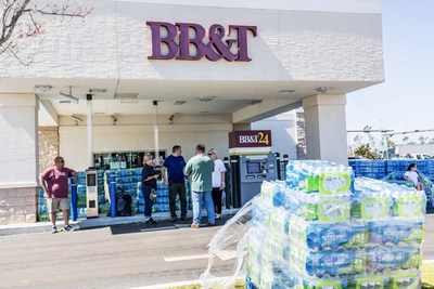 In the aftermath of Hurricane Michael, BB&T distributes humanitarian aid to the community at its Panama City, Florida, branch on Saturday, Oct. 13.