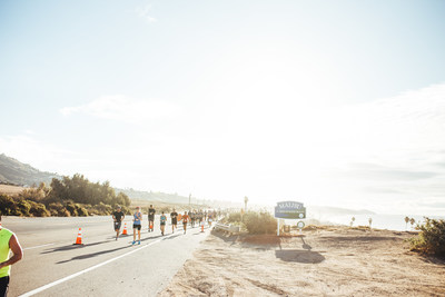 The Malibu Half Marathon course runs by the iconic Malibu sign '21 MILES OF SCENIC BEAUTY'