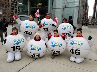 The life-sized LOTTO MAX Balls spread the word about the record-breaking LOTTO MAX $60 million jackpot plus 53 MAXMILLIONS up for grabs this Friday. (CNW Group/OLG)