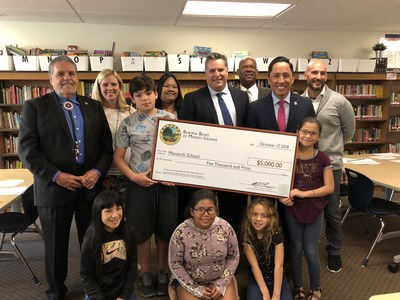 Students and Faculty at San Diego's Monarch School Receive $5,000 Barona Education Grant to Update Classroom Technology. From left to right: Barona Tribal Chairman Edwin 