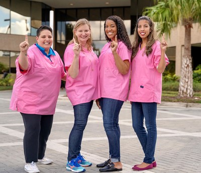 Three Ultimate Medical Academy employees with unique and heart wrenching stories about battling and beating cancer – Amber Acosta, Learner Services Advisor, Ilyasha Hood, Strategic Partnerships Regional Manager, and Yliana Rodriguez, Learner Services New Student Advisor – will join more than 675 UMA walkers, including Beth Garland, Senior Vice President of Human Resources (second from left), on Top Team UMA at the Making Strides Against Breast Cancer Walk in Tampa on Saturday, Oct. 20.