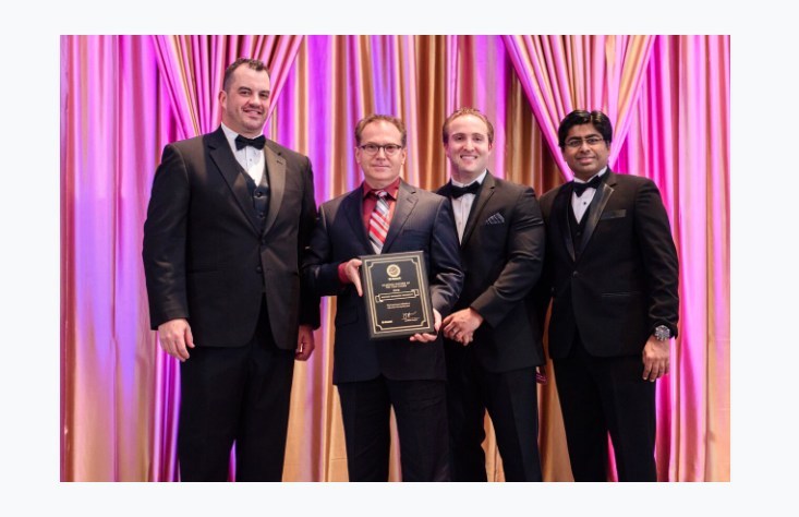 WGU Curriculum Program Manager, Dr. Carlo Sapijaszko receives award from EC Council's Sr. Vice President Global, Steve Graham at Partner Awards in Atlanta, GA.