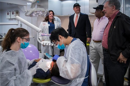 USC Mobile Dental Clinic Director Sanaz Fereshteh provides exam tour to CRC CEO Todd Stevens, LA County Supervisor Mark Ridley-Thomas and LAUSD Board Member George McKenna