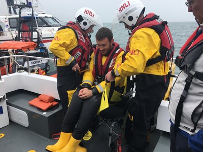 Rescuers using ADAPTS portable transfer sling during an evacuation drill at sea. ADAPTS is launching #WhyWait, an awareness campaign to highlight why it is necessary for people with disabilities to have a disaster plan for emergencies at home or while traveling.