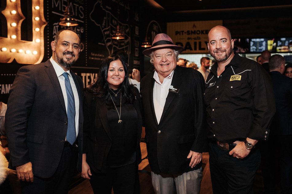 Laura Rea Dickey, CEO of Dickey's Barbecue Restaurants, Inc.; Mr. Dickey, Founder of Dickey's Barbecue Pit; Chris Kelley, Dean of Barbecue University and Youssef El Habbal, CEO of Serenity Hospitality at the first Dickey's Barbecue Pit international opening in Abu Dhabi.