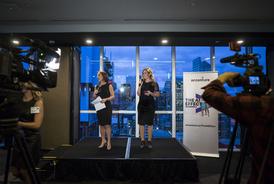 Technology reporter Amber Mac, right, and Jodie Wallis, Managing Director of Accenture's AI practice in Canada, co-hosts of the number one Canadian business news podcast, "The AI Effect", talk with guests at a Season 2 launch party in Toronto, Ont. on Wednesday, October 24, 2018.  THE CANADIAN PRESS IMAGES/J.P. Moczulski (CNW Group/Accenture)