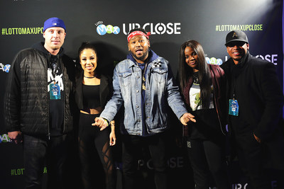 Winners Cody Smith (L) and Renard Patrick (R) pose with Keisha Chanté, Boi-1da and Savannah Ré, during an exclusive meet and greet prior to the start of the concert at the Mod Club in Toronto on Wednesday. The only way in was to win with the LOTTO MAX ‘Up Close Concert Series’ Contest. (Photo Credit: Riley Taylor) (CNW Group/OLG Winners)