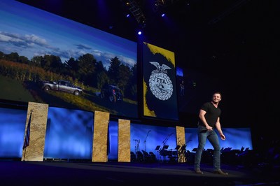 Country music artist Easton Corbin performs the new track "Farmer in All of Us",  honoring extraordinary individuals who have made a significant agricultural impact in their communities and who embody the immortal words of Paul Harvey’s iconic “So God Made a Farmer” speech, at the 2018 National FFA Convention & Expo.
Photo credit: Ram Truck/Chris Owens