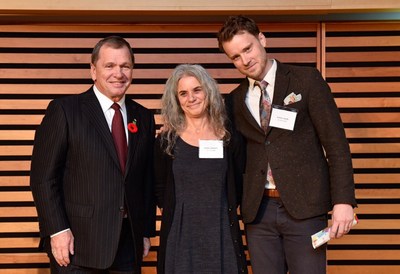 Frank McKenna, Deputy Chair, TD Bank Group, congratulates author Joanne Schwartz and illustrator Sydney Smith as the joint winners of the 2018 TD Canadian Children’s Literature Award for their book, Town Is By The Sea. Schwartz and Smith will split the top prize of $50,000, the largest cash prize in Canadian children’s literature. As part of The Ready Commitment, this year’s prize from TD was increased from $30,000 to help provide greater support to children’s authors and illustrators to continue to pursue their talent. (CNW Group/TD Bank Group)
