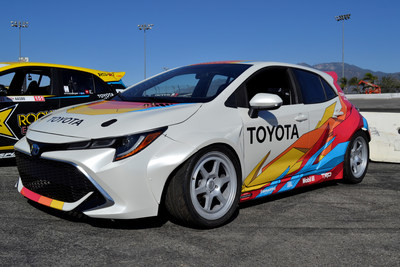Papadakis Racing modified a 2019 Corolla Hatchback to compete in the Formula DRIFT Pro series. The car was torn down to a bare chassis and the drivetrain was converted from front- to rear-wheel drive, the chassis’ center section cut apart and rebuilt to accept the transmission and driveline. The car on display is a clone of the Pro drift car; a Drift demonstration vehicle that underwent the same build process, engine tuned to 850hp, and features an “old school meets new school” TRD-Blue Flame livery.