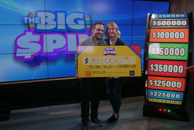 With his wife Megan in attendance to cheer him on, Michael Tallari of Thunder Bay spins THE BIG SPIN Wheel at the OLG Prize Centre in Toronto. Tallari won a top prize with OLG’s INSTANT game – THE BIG SPIN. (CNW Group/OLG Winners)