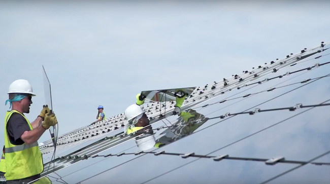 Conti Solar’s construction teams install solar panels in Cuyahoga Landfill Solar Project outside of Brooklyn, Ohio.