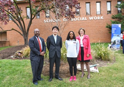 Howard University Provost Anthony Wutoh, All Nippon Airways VP Naohiro Terakawa, 2020 Olympic competitor Latroya Pina and National Cherry Blossom Festival President Diana Mayhew participate in a tree planting ceremony on campus.