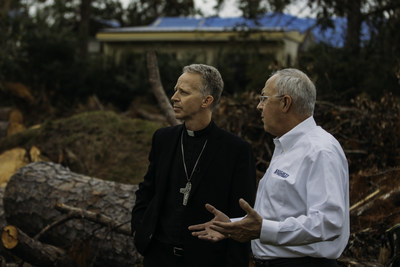 During the visit, Supreme Knight Anderson and Bishop William Wack of the Diocese of Pensacola-Tallahassee survey some of the damage caused by Hurricane Michael. The Knights made donations of $526,000 to assist with the rebuilding of churches and schools. (Photo Courtesy of Knights of Columbus)