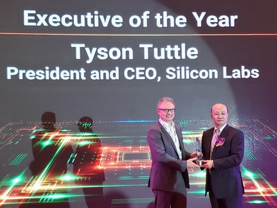 Silicon Labs CEO Tyson Tuttle receives ASPENCORE WEAA Executive of the Year Award. Tyson Tuttle (left) and Yorbe Zhang, Head of ASPENCORE APAC (right). Silicon Labs CEO Tyson Tuttle receives ASPENCORE WEAA Executive of the Year Award. Tyson Tuttle (left) and Yorbe Zhang, Head of ASPENCORE APAC (right).
