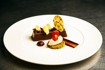 Photo of Milk Chocolate–Pistachio Terrine with Blood Orange Sorbet, Spiced Shortbread Crumble, and Warm Cranberry–Port Compote courtesy of Stephanie Hernandez.