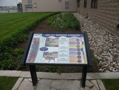 The rain garden at ITC's Iowa City warehouse allows storm water to soak into the ground instead of flowing into storm drains and surface waters. This reduces erosion, water pollution, flooding and promotes healthier groundwater.  The award-winning rain garden is designed with plants and loose fill to absorb approximately 4,000 gallons of precipitation runoff in each precipitation event.
