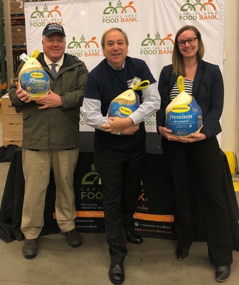 For the holidays, American Humane and Butterball delivered 6,000 meals' worth of humanely raised American Humane Certified turkey to those in need. (L to R: American Humane Farm Program Director Marty Frankhouser, American Humane CCO Mark Stubis, and Capital Area Food Bank Director of Food Resources Molly McGlinchy).