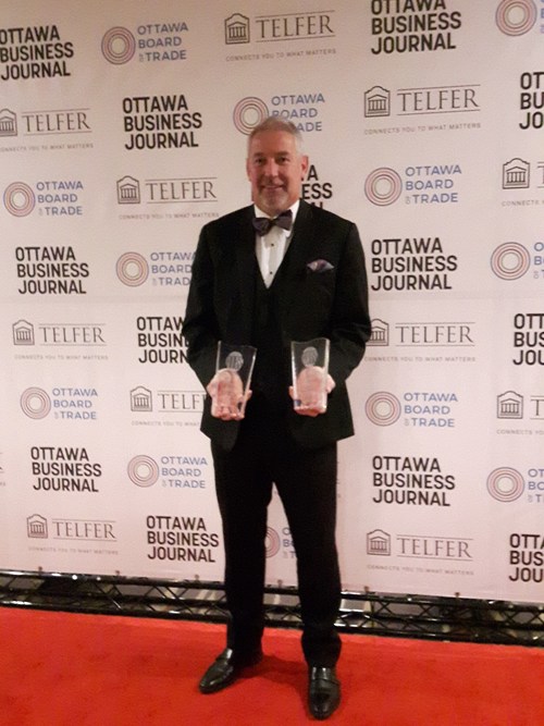 John Proctor, CEO of Martello, accepted two awards at the 2018 Best Ottawa Business Awards (BOBs) Gala on November 16th. (CNW Group/Martello Technologies Group)