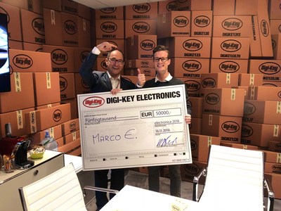Hermann Reiter Presents Marco E. with the Cash Prize Winnings at electronica
