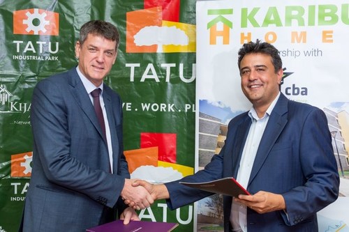 Stephen Jennings Founder and CEO of Rendeavour and Ravi Kohli of Karibu Homes at the signing ceremony to develop 1,000 affordable homes at Tatu City. (PRNewsfoto/Tatu City)