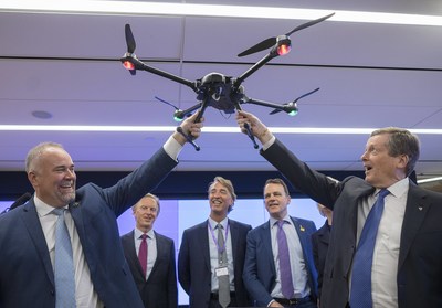 Ontario Minister of Economic Development, Job Creation and Trade Todd Smith, front left,  and Toronto Mayor John Tory hold Accenture's industrial asset inspection drone as (L-R) Accenture's Canada President Bill Morris, incoming President Jeffrey Russell, and CMHC CEO Evan Siddall look on at the launch of Accenture's Canada Innovation Hub in Toronto, Ont. on Tuesday, November 27, 2018. (CNW Group/Accenture)
