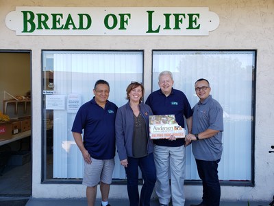 Weiland Door employees present a donation to Bread of Life in Oceanside, California as part of Andersen Corporate Foundation's $960,000 donation to organizations focused on affordable housing, health and safety, education and human services.