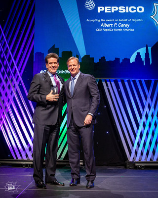 GENYOUth Gala, New York City, November 27, 2018: Commissioner of the National Football League, Roger Goodell, presents the Vanguard Award to Al Carey, CEO, PepsiCo North America, accepting on behalf of PepsiCo.