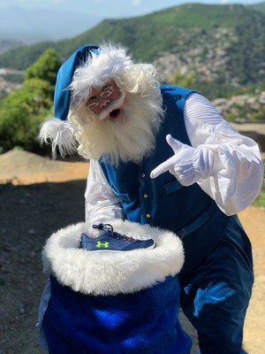 Le père Noël bleu en route pour surprendre l’école L’Union dans le village de Calvaire en Haïti (Groupe CNW/WESTJET, an Alberta Partnership)